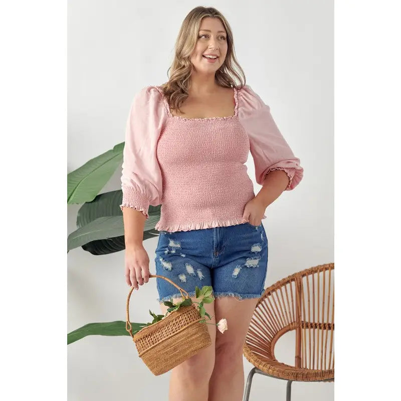 Chic and feminine blush pink smocked ruffled top with a chic square neckline. Available in standard plus sizes (SM-3XL).