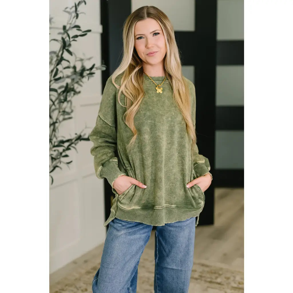Wrap yourself in cozy vibes with our Stormy Pistachio Latte Pullover! Featuring stretchy fleece drop shoulders
