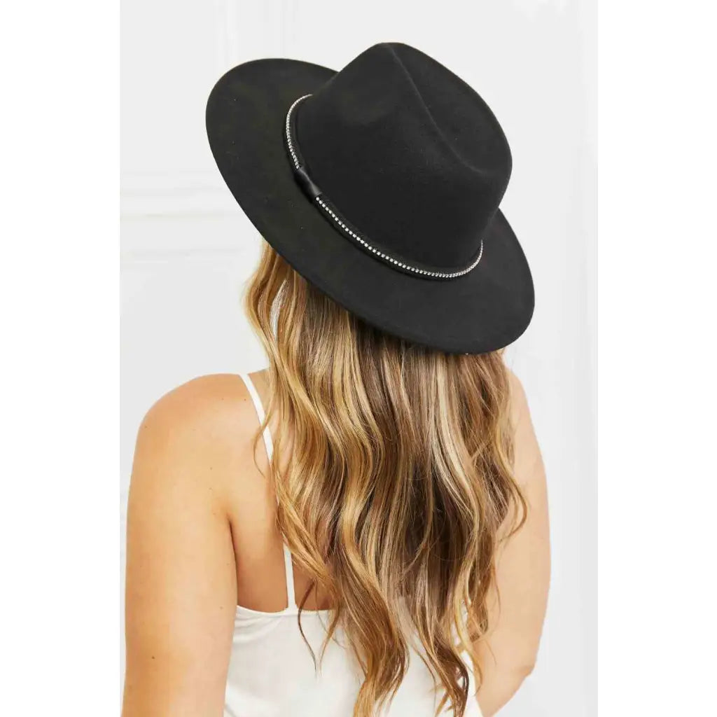 Our Touch of Bling Black Fedora Hat is the perfect accessory for any occasion that requires just a touch sparkle.
