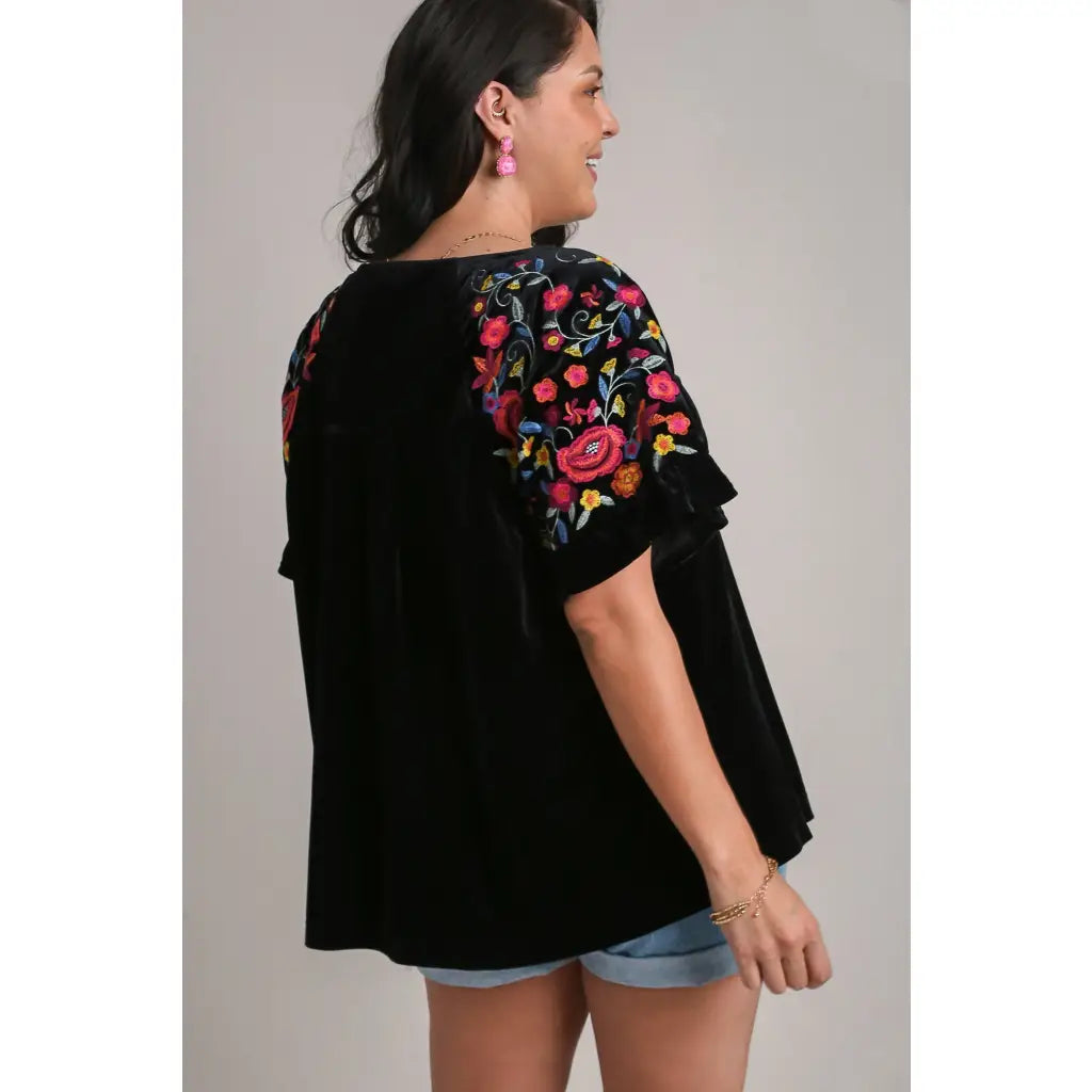 Our Velvet Embroidery Sleeve Blouse in Black is a stunning piece that combines fun look with touch of vintage charm.