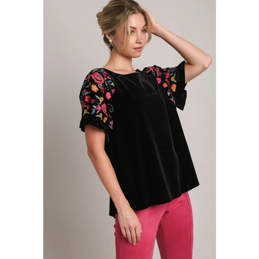 Our Velvet Embroidery Sleeve Blouse in Black is a stunning piece that combines fun look with touch of vintage charm.