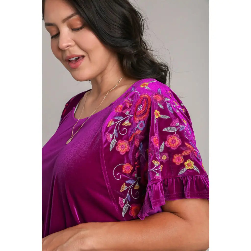 Our Velvet Embroidery Sleeve Blouse in Violet is a stunningly vibrant piece that combines fun look with touch