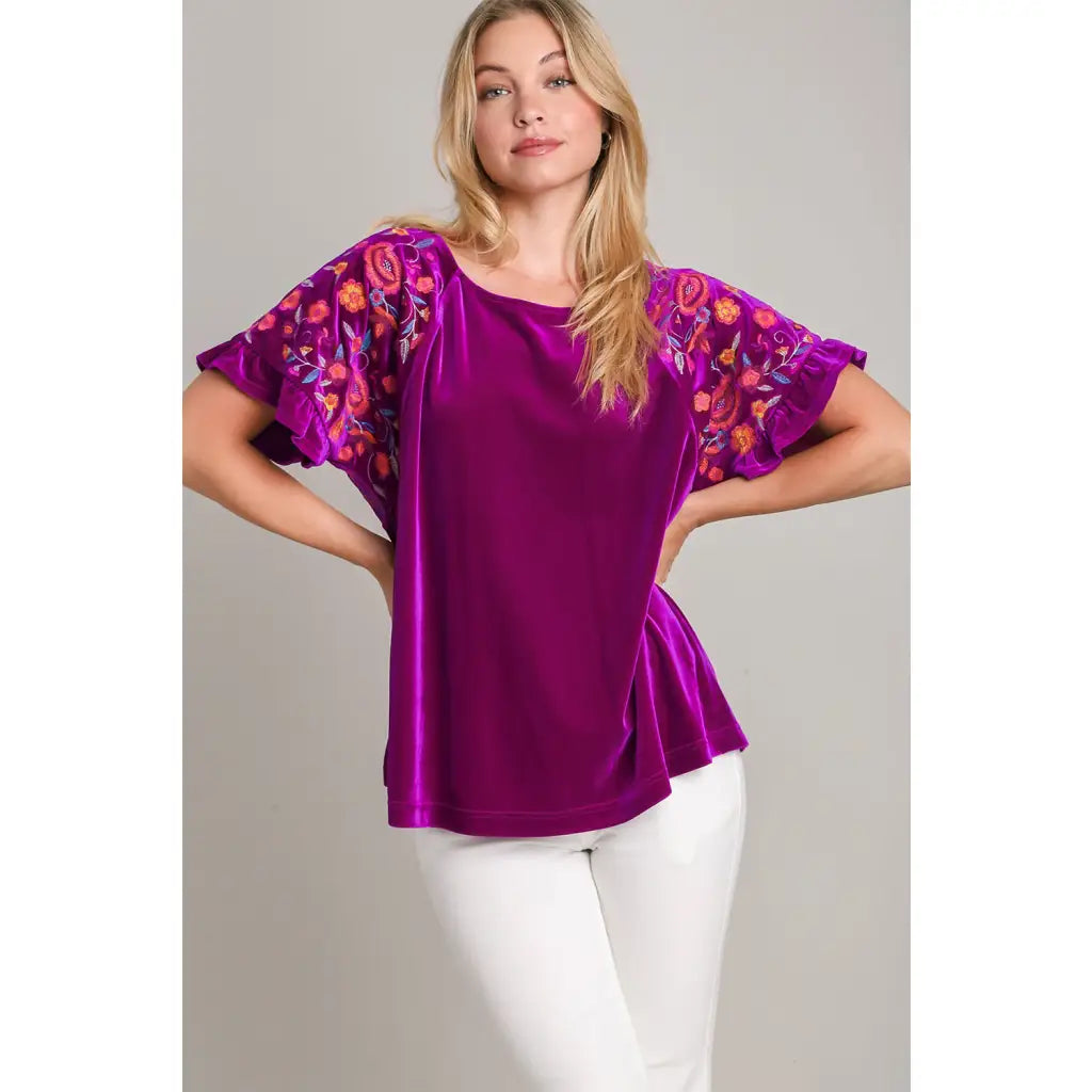 Our Velvet Embroidery Sleeve Blouse in Violet is a stunningly vibrant piece that combines fun look with touch