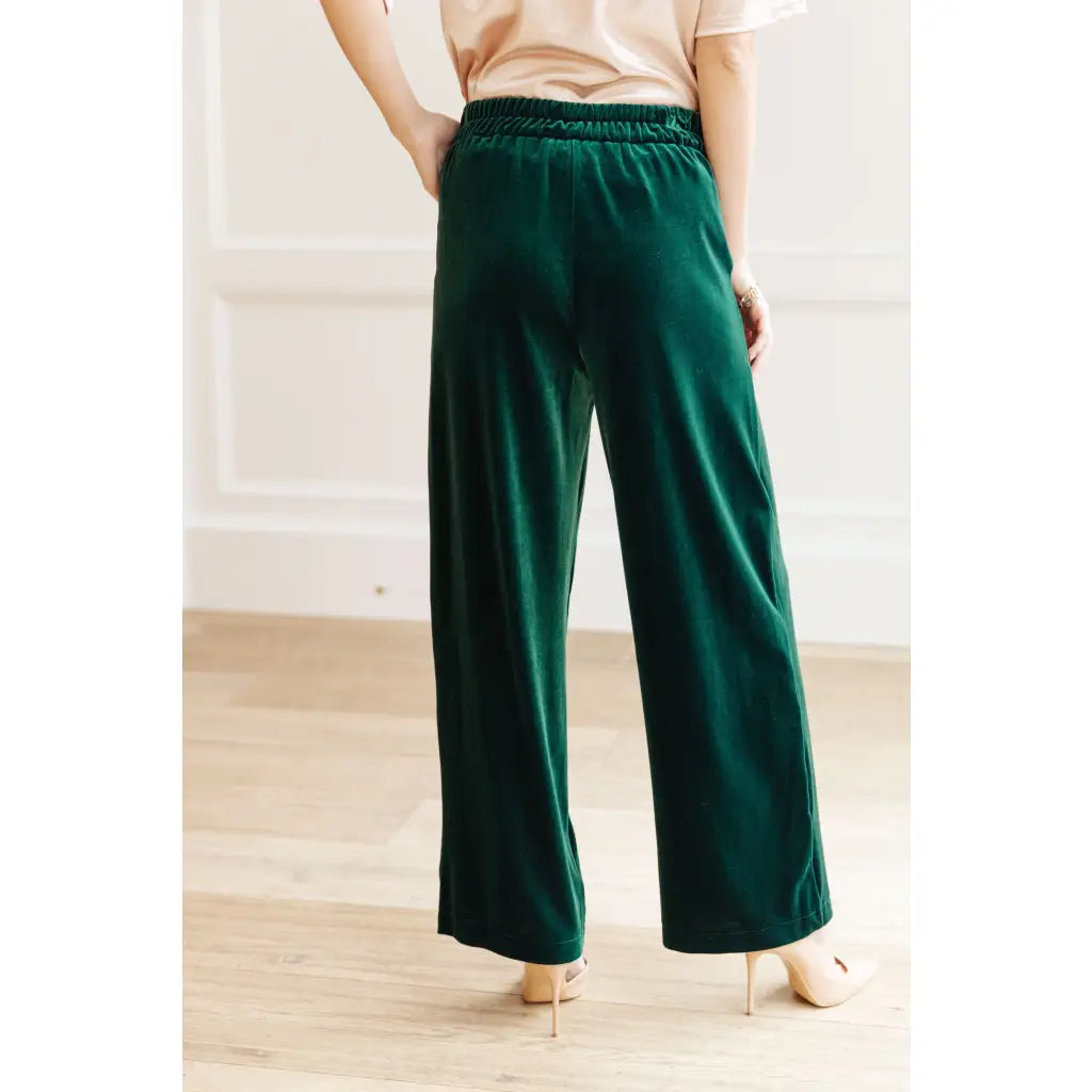 These Velvet Emerald Wide Leg Pants feel ultra luxe and are guaranteed to make a bold statement. Cut from emerald