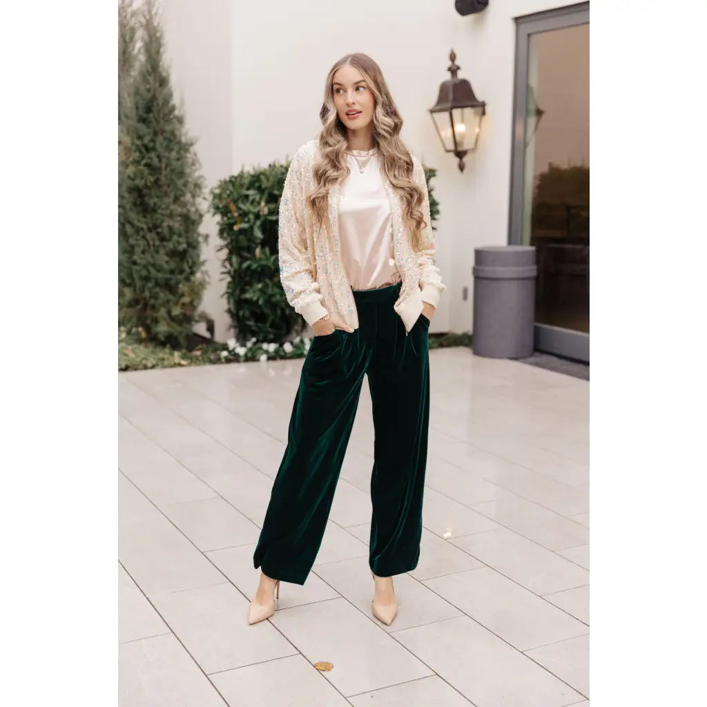 These Velvet Emerald Wide Leg Pants feel ultra luxe and are guaranteed to make a bold statement. Cut from emerald
