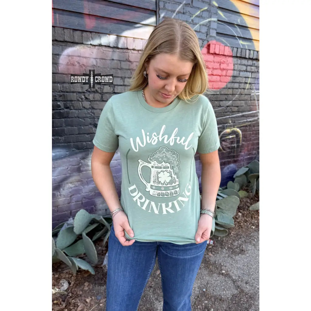 Celebrate in style with the Wishful Drinking T Shirt! A soft lightweight green tee. Plus it’s available sizes S 3XL!