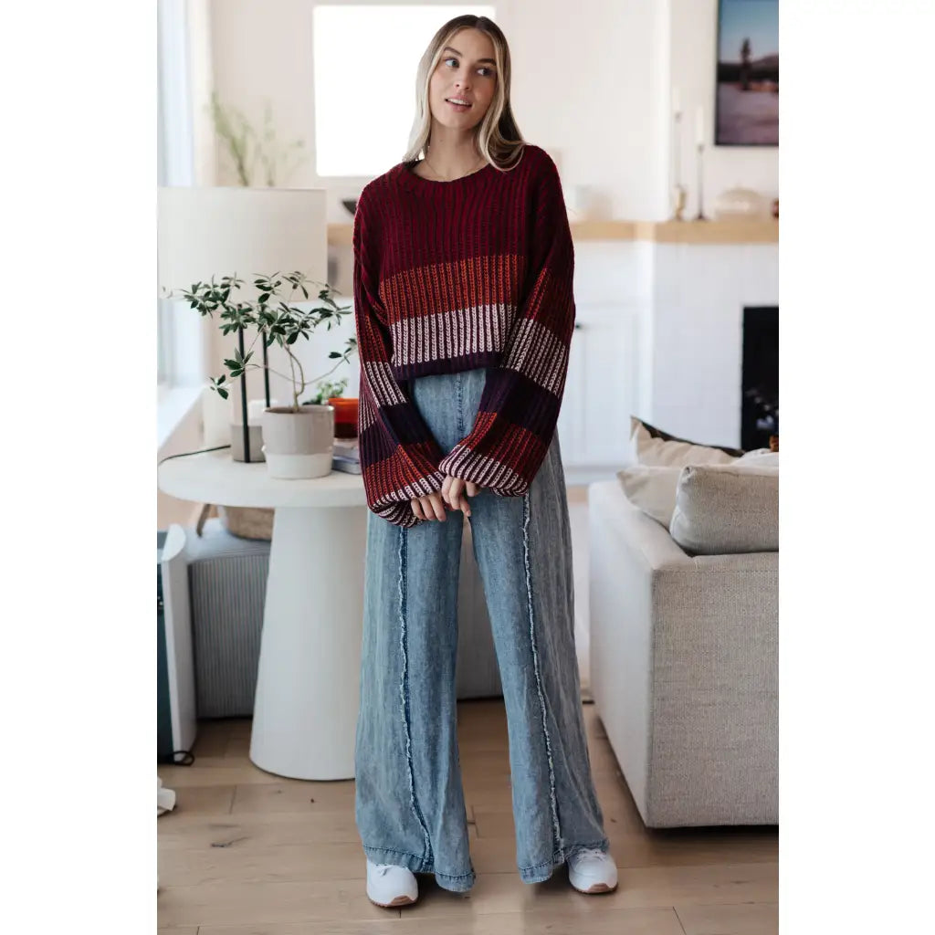 Stay cozy this season in our Wonderful World Striped Sweater. Featuring an oversized fit crew neckline dropped