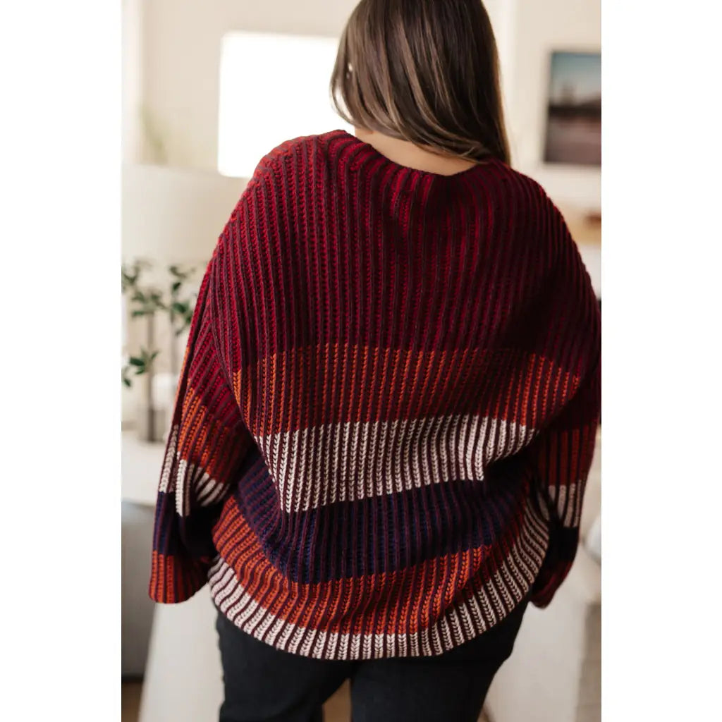 Stay cozy this season in our Wonderful World Striped Sweater. Featuring an oversized fit crew neckline dropped