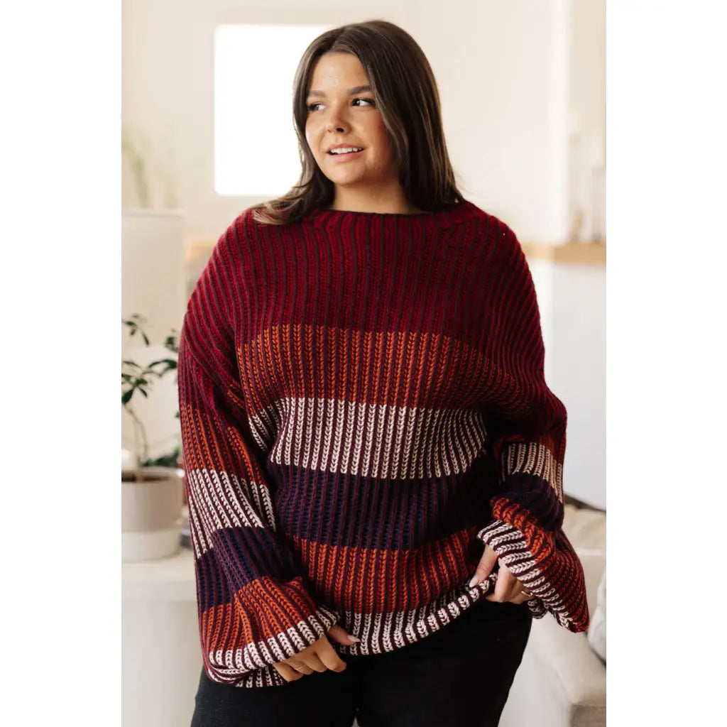 Stay cozy this season in our Wonderful World Striped Sweater. Featuring an oversized fit crew neckline dropped