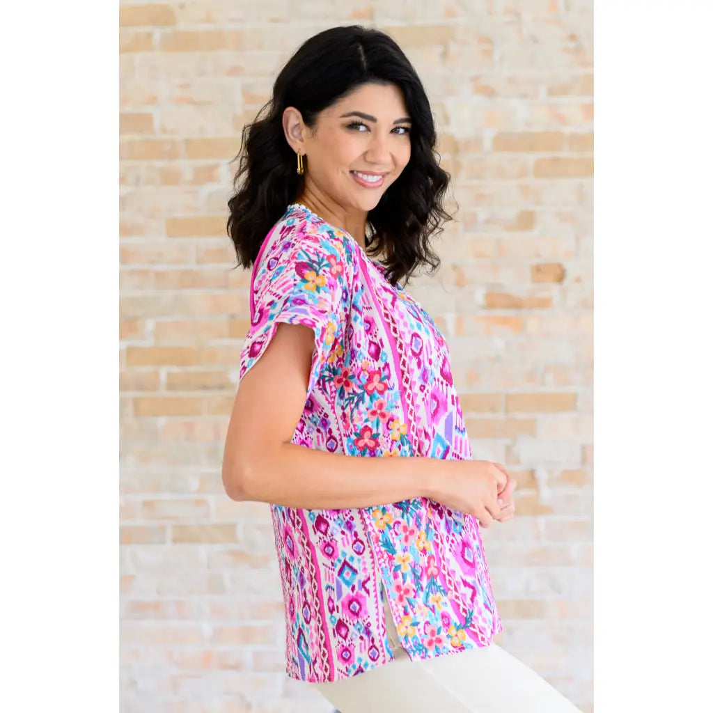 Our Yours Truly V-Neck Top in Magenta features woven fabric is lightweight and perfect for warm weather! The dolman