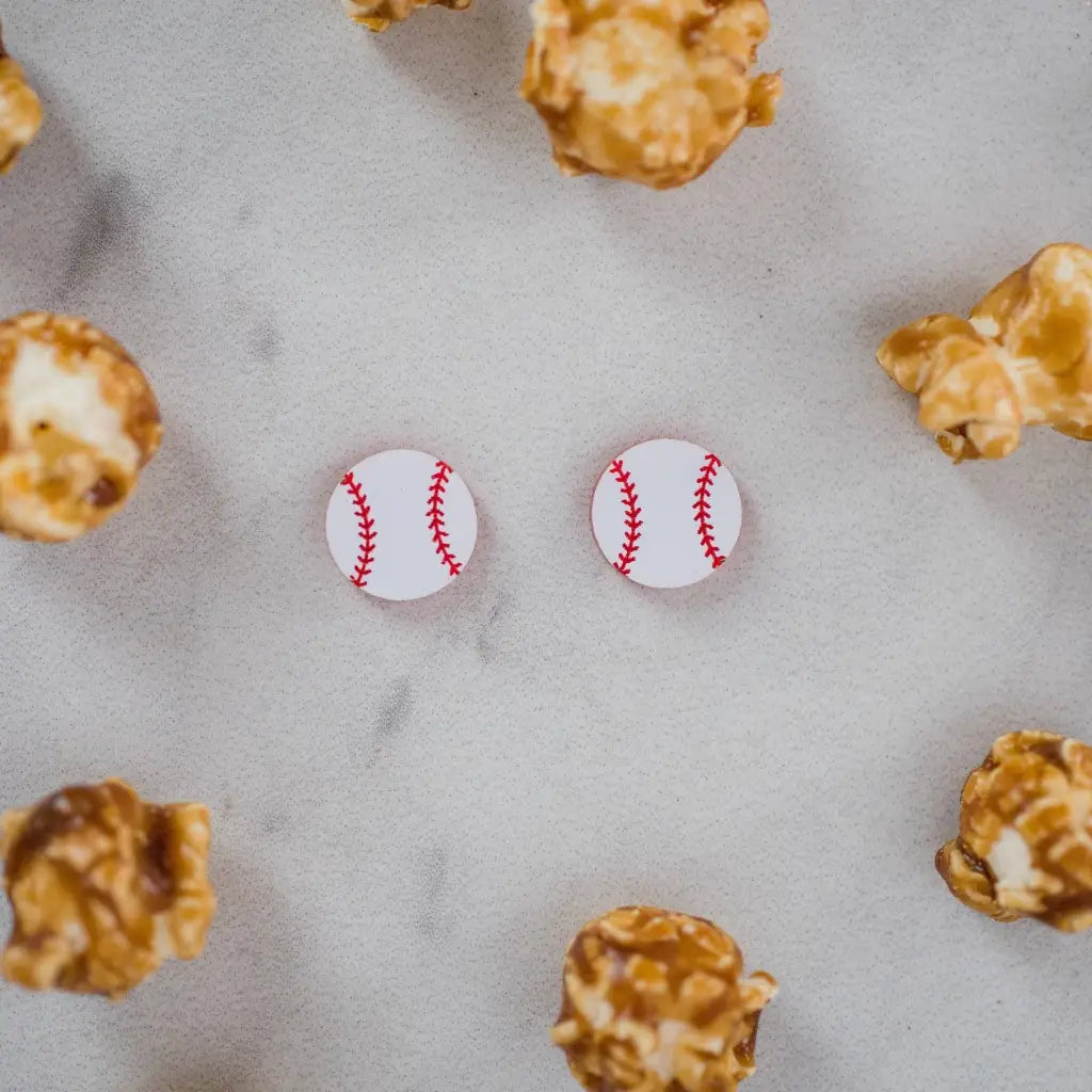 Hand drawn laser cut and engraved red white baseball acrylic studs. Great for sensitive ears! 14mm Material: