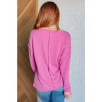 Get cozy in our A Notch Above Ribbed Knit Top Pink! This stretchy and oversized long sleeve top features a unique notch