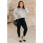 Our Abstract Dots Button Down Blouse features a collared neckline and drop shoulder for classic look. Made