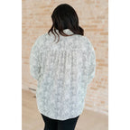 Our Abstract Dots Button Down Blouse features a collared neckline and drop shoulder for classic look. Made