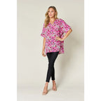 Stay stylish at work and beyond with the Abstractly Mine Printed V-Neck Short Sleeve Blouse. Lightweight breathable