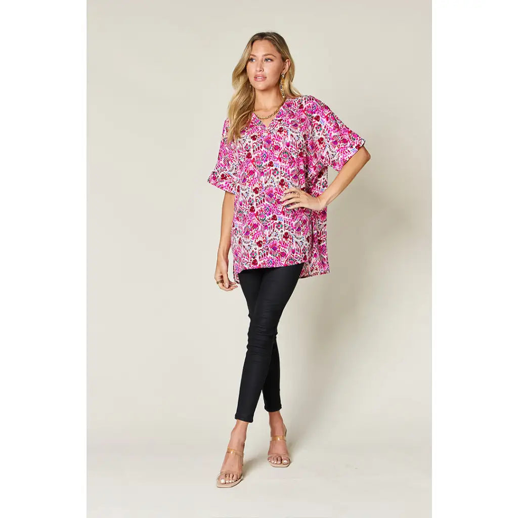 Stay stylish at work and beyond with the Abstractly Mine Printed V-Neck Short Sleeve Blouse. Lightweight breathable