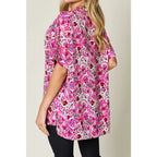 Stay stylish at work and beyond with the Abstractly Mine Printed V-Neck Short Sleeve Blouse. Lightweight breathable