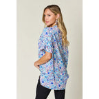 Stay stylish at work and beyond with the Abstractly Mine Printed V-Neck Short Sleeve Blouse. Lightweight breathable