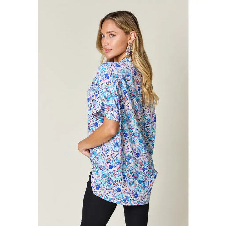 Abstractly Mine Printed V-Neck Short Sleeve Blouse – Chic