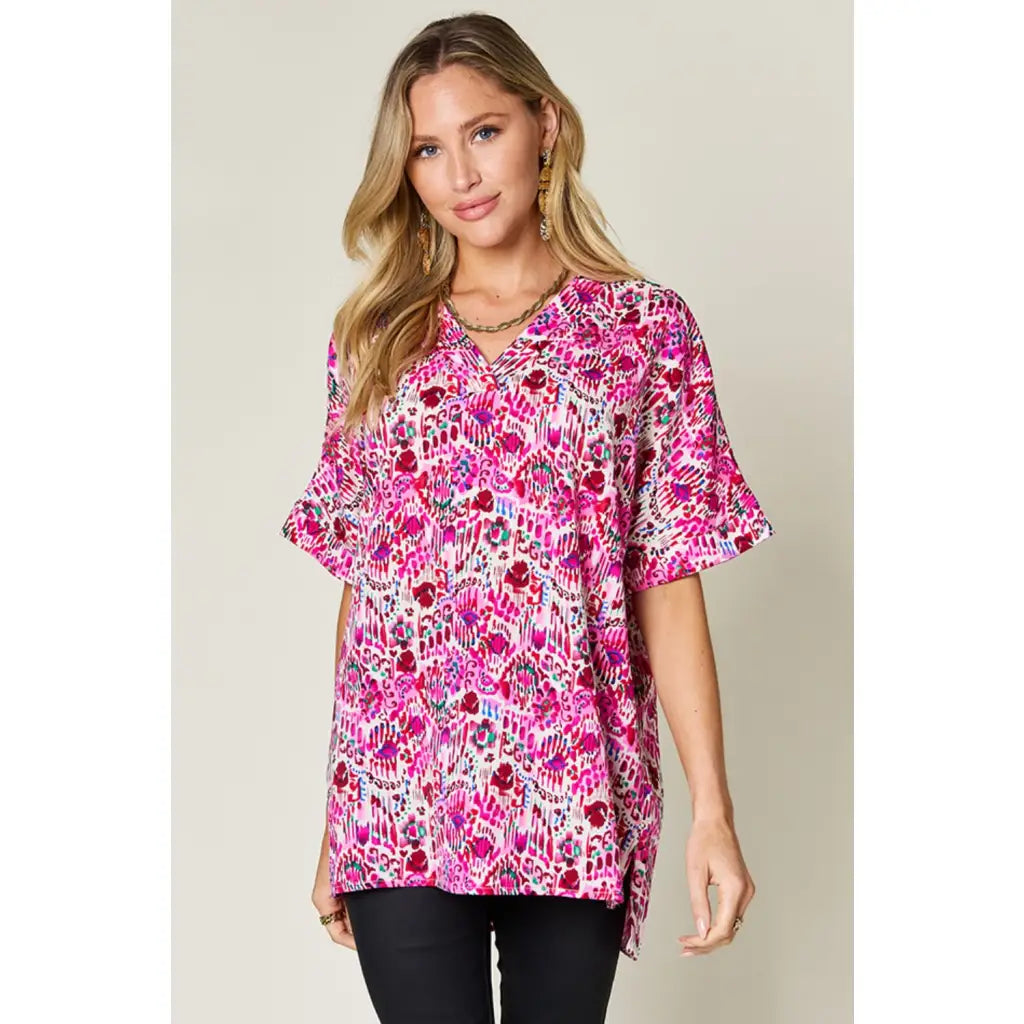 Stay stylish at work and beyond with the Abstractly Mine Printed V-Neck Short Sleeve Blouse. Lightweight breathable