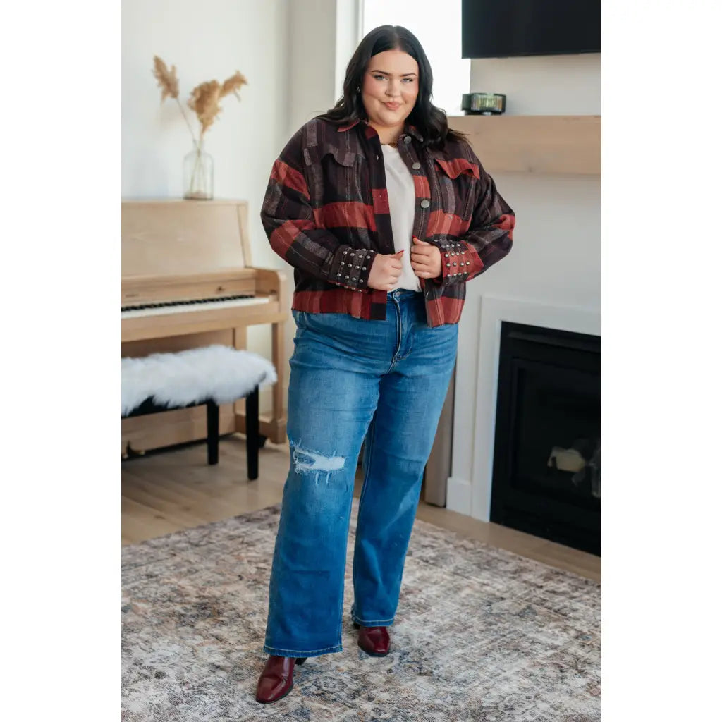 Our Already There Plaid Cropped Shacket is crafted from a brushed mid weight flannel in shades of orange rust and brown