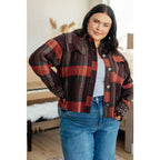 Our Already There Plaid Cropped Shacket is crafted from a brushed mid weight flannel in shades of orange rust and brown