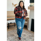 Our Already There Plaid Cropped Shacket is crafted from a brushed mid weight flannel in shades of orange rust and brown