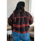 Our Already There Plaid Cropped Shacket is crafted from a brushed mid weight flannel in shades of orange rust and brown