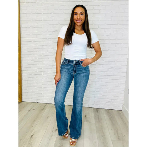 Ariana High Rise Flare Jeans with a double-button waistband & 4-way stretch perfect for flattering fit. Perfect regular