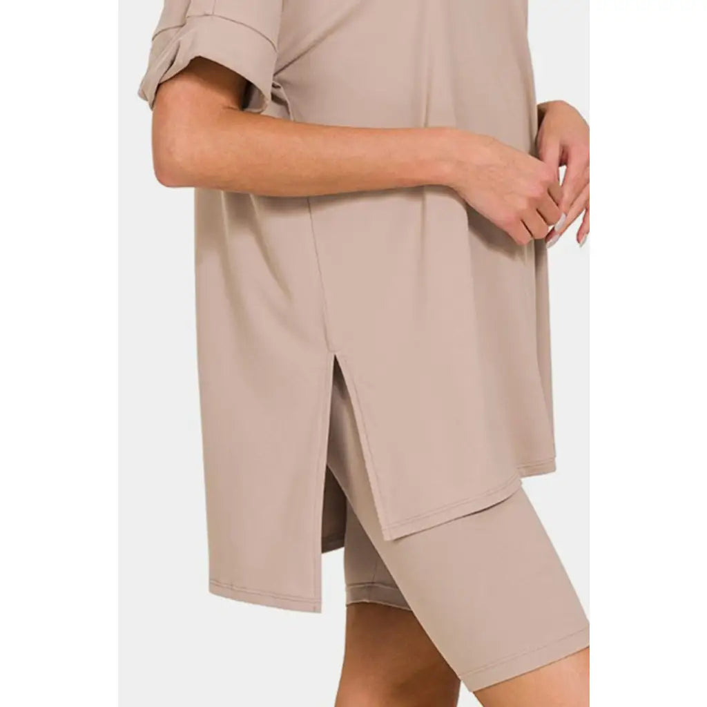 Stay cool and comfortable in our Ash Mocha Comfy Vibes Shorts Set! The short sleeve slit oversized t-shirt long line
