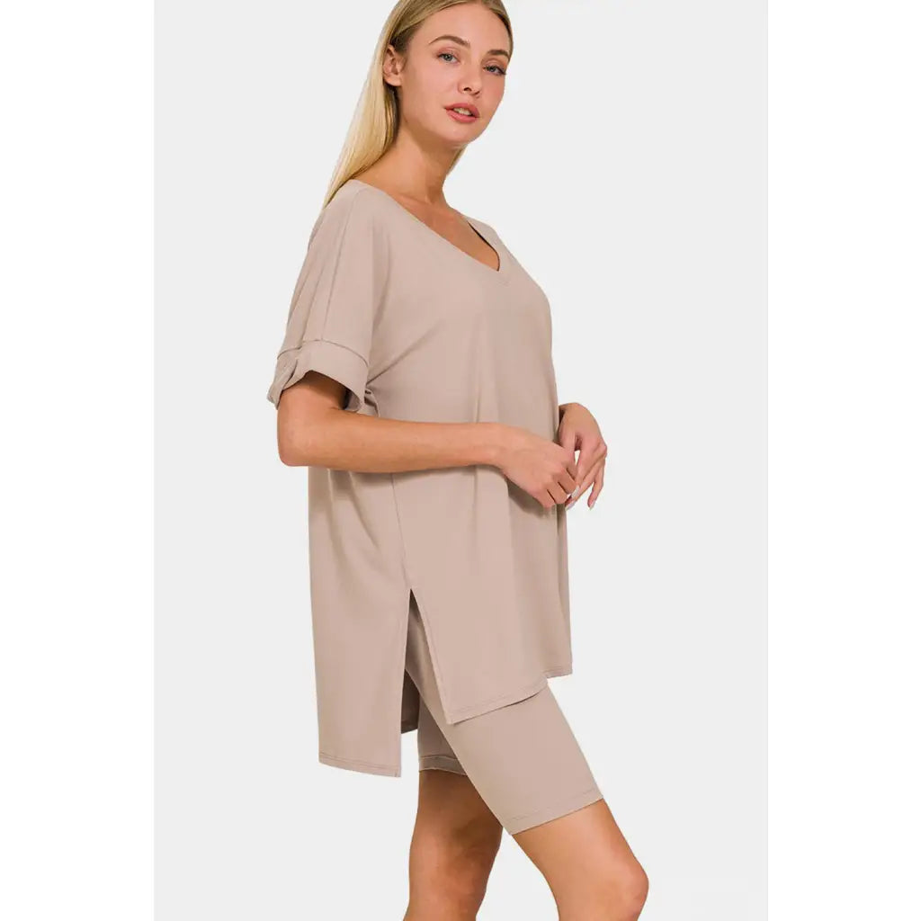 Stay cool and comfortable in our Ash Mocha Comfy Vibes Shorts Set! The short sleeve slit oversized t-shirt long line