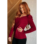 Our fabulous Ask A Question Ruched Sleeve Top will be the perfect wardrobe staple! The red jacquard knit gives