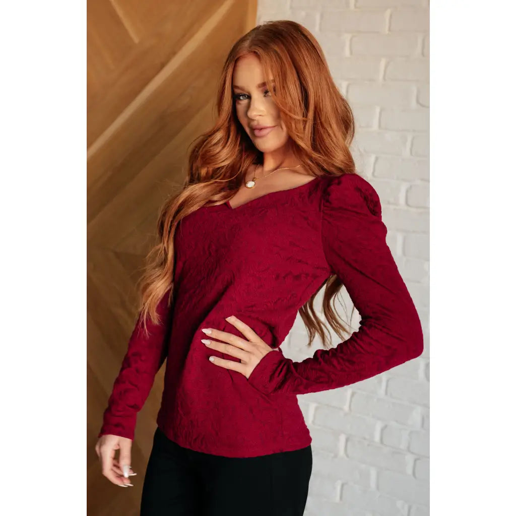 Our fabulous Ask A Question Ruched Sleeve Top will be the perfect wardrobe staple! The red jacquard knit gives