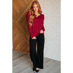 Our fabulous Ask A Question Ruched Sleeve Top will be the perfect wardrobe staple! The red jacquard knit gives