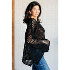 Reel in some serious style with our Ask Anyway Fishnet Sweater. Its boat neckline dropped shoulder side slits and black