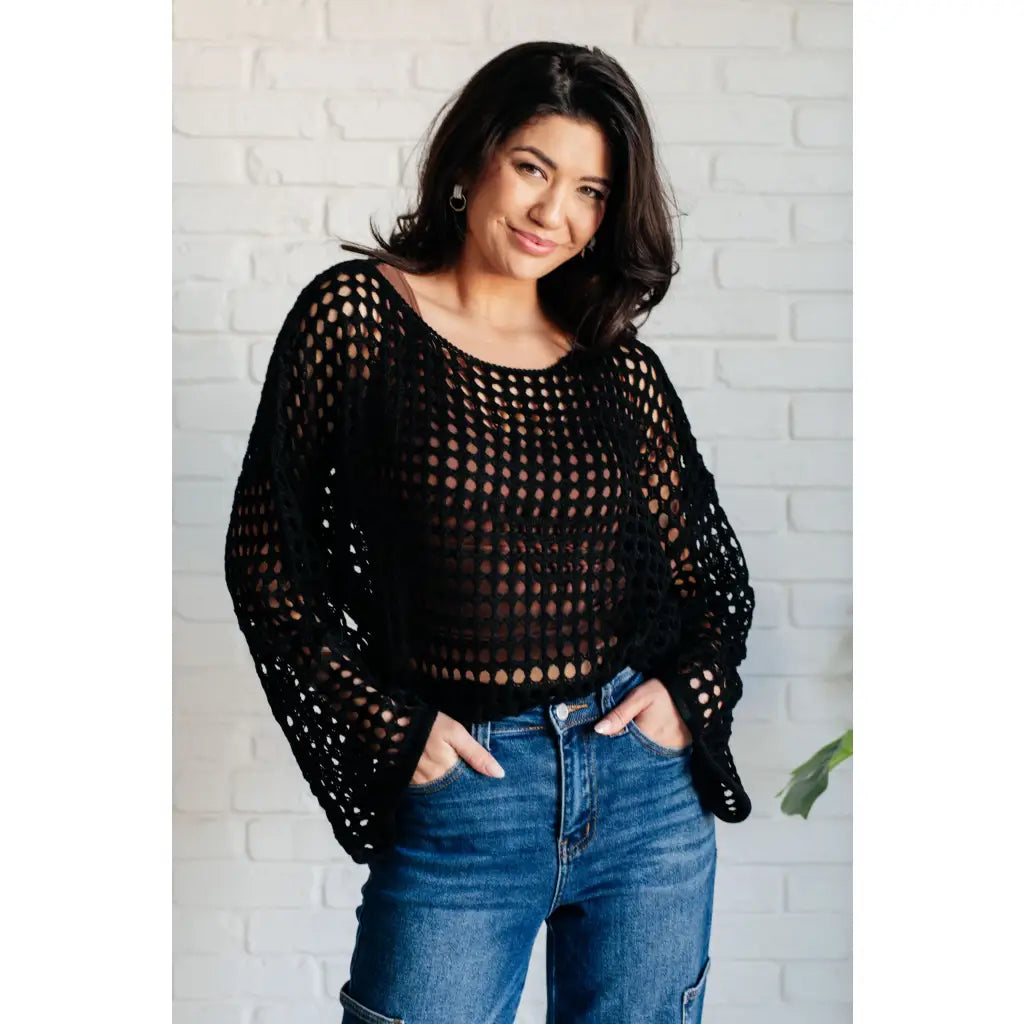 Reel in some serious style with our Ask Anyway Fishnet Sweater. Its boat neckline dropped shoulder side slits and black