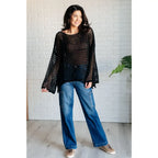 Reel in some serious style with our Ask Anyway Fishnet Sweater. Its boat neckline dropped shoulder side slits and black