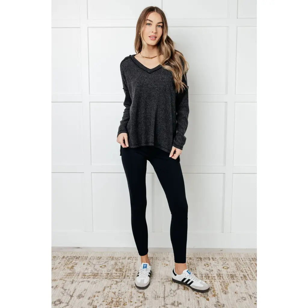 Get ready to cuddle up in our Basically Freezing Brushed Hacci Top Black! Its brushed stretchy fabric will keep