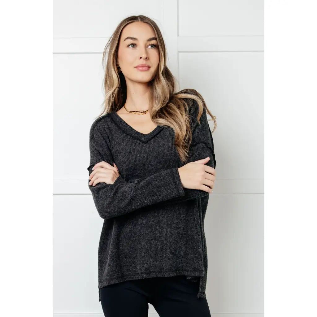 Get ready to cuddle up in our Basically Freezing Brushed Hacci Top Black! Its brushed stretchy fabric will keep