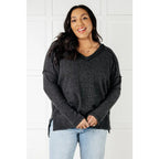 Get ready to cuddle up in our Basically Freezing Brushed Hacci Top Black! Its brushed stretchy fabric will keep