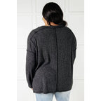 Get ready to cuddle up in our Basically Freezing Brushed Hacci Top Black! Its brushed stretchy fabric will keep