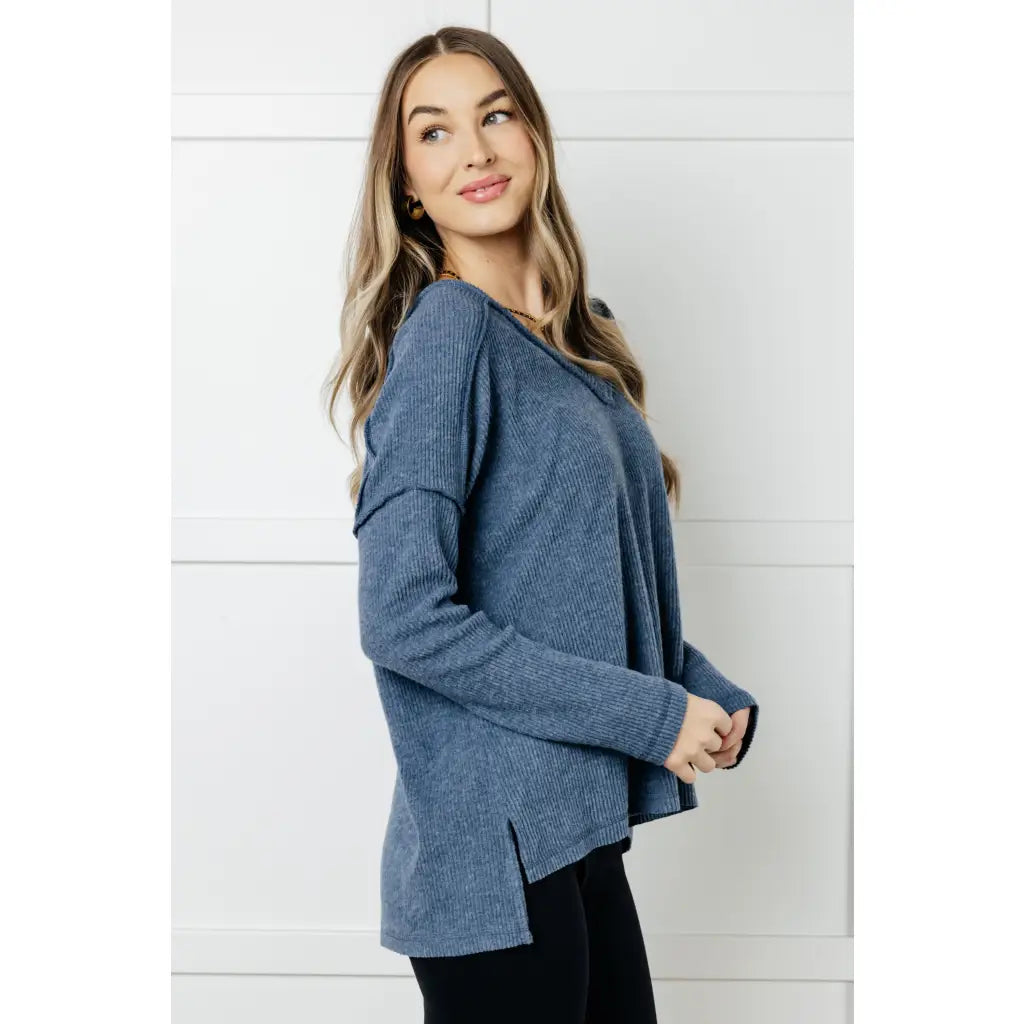 Get ready to cuddle up in our Basically Freezing V-Neck Top Dusty Blue! Its soft brushed hacci fabric and stretchy