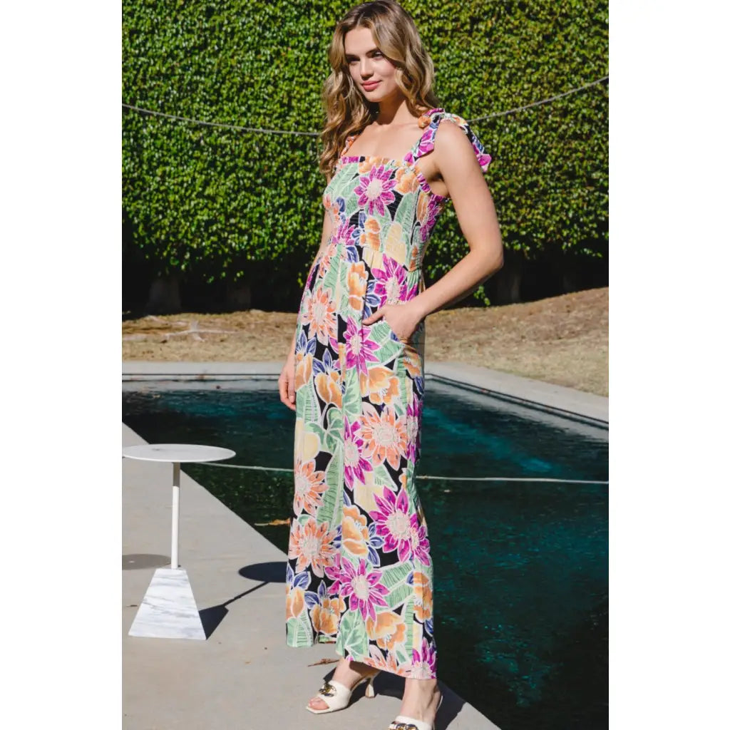 Our Be Bold Floral Wide Leg Jumpsuit is a fabulous and versatile piece that combines floral elegance with chic