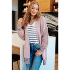 Our Be Still V-Neck Striped Sweater features a classic black and white stripe pattern that adds timeless versatile look