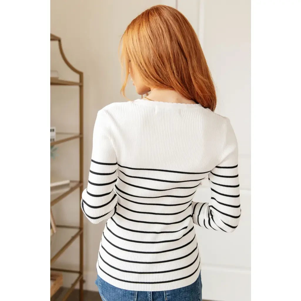 Our Be Still V-Neck Striped Sweater features a classic black and white stripe pattern that adds timeless versatile look