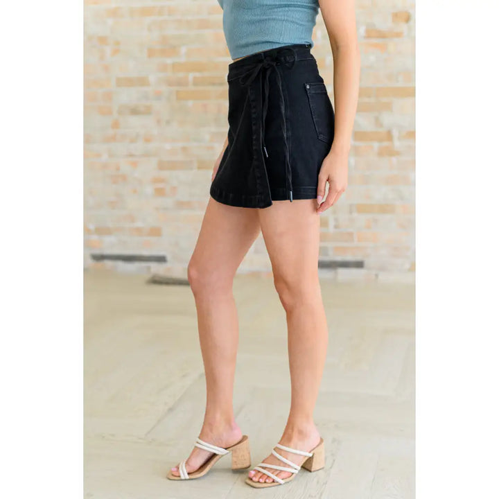 Bentli High Rise Side Tie Denim Skort in Black - Womens