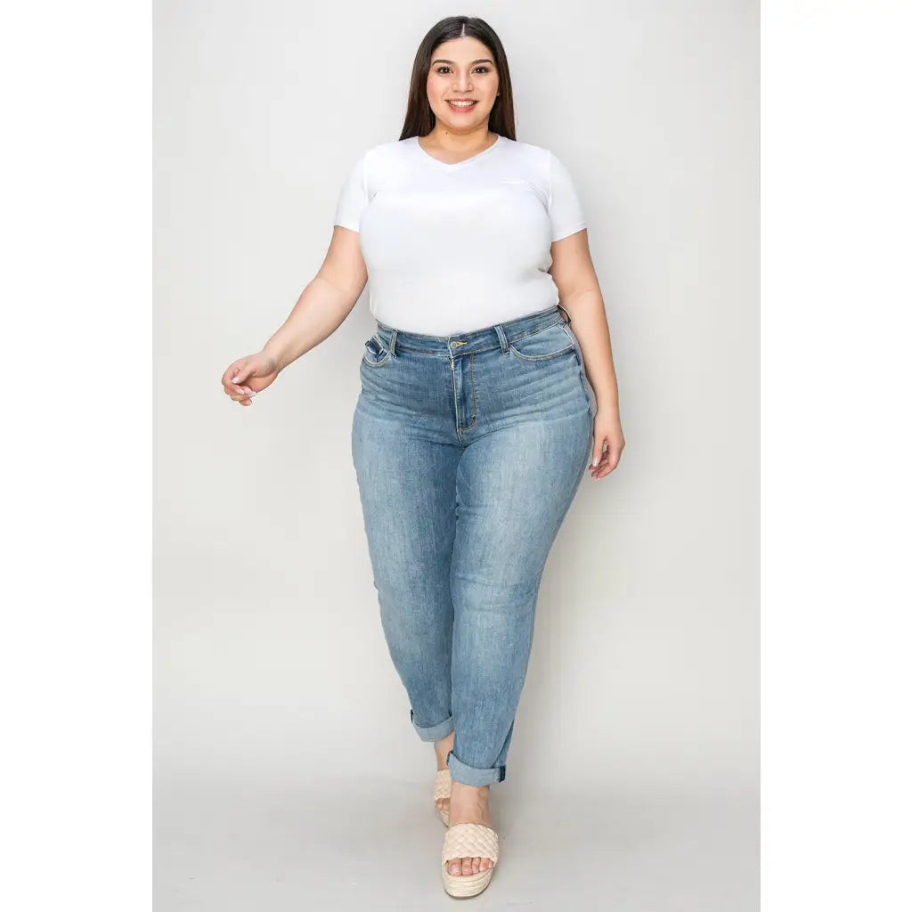 Elevate your denim game with our Best Eva Cuffed Hem Slim Fit Judy Blue Jeans. The cropped cuffed hem detail adds