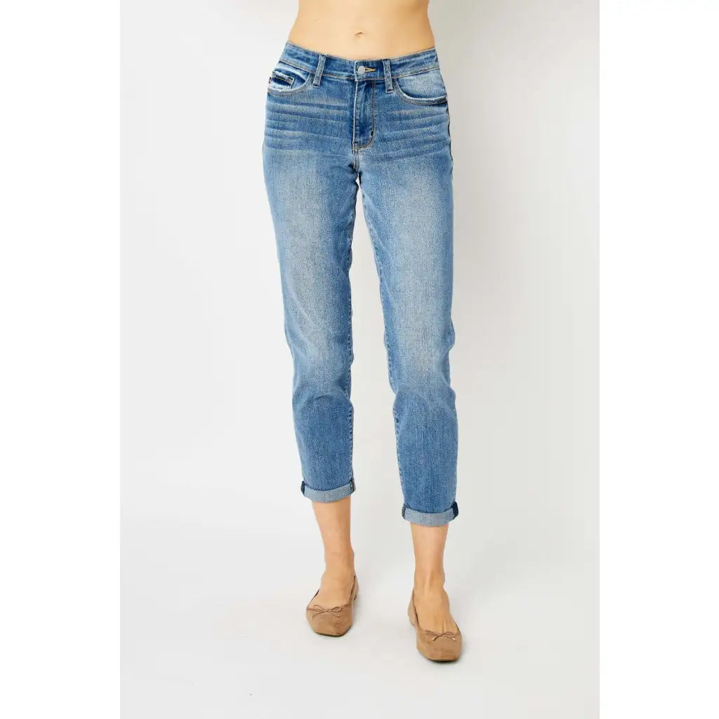 Elevate your denim game with our Best Eva Cuffed Hem Slim Fit Judy Blue Jeans. The cropped cuffed hem detail adds