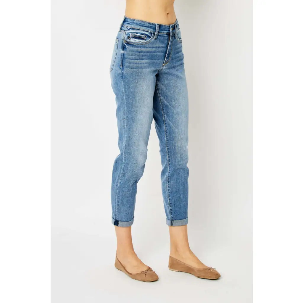 Elevate your denim game with our Best Eva Cuffed Hem Slim Fit Judy Blue Jeans. The cropped cuffed hem detail adds