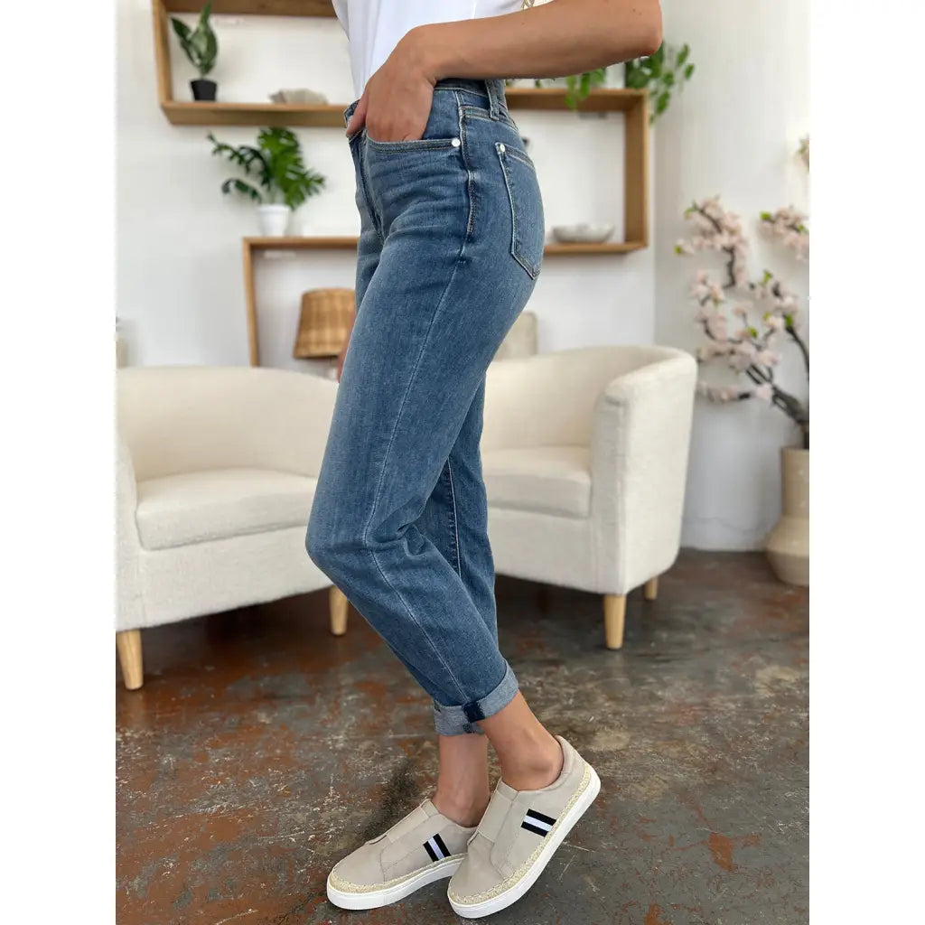 Elevate your denim game with our Best Eva Cuffed Hem Slim Fit Judy Blue Jeans. The cropped cuffed hem detail adds